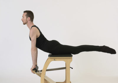Back Extension Pilates on EXO Chair