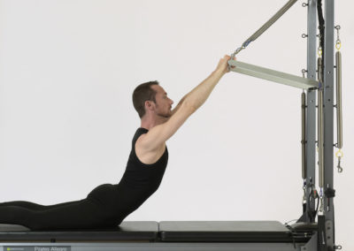 Back Extension Pilates on Tower