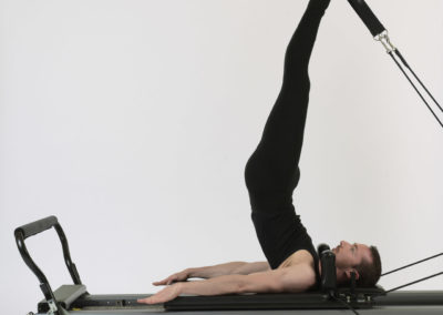 During Short Spine Pilates Reformer