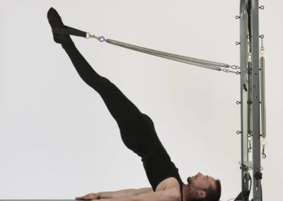 Magician Straps Pilates on Tower